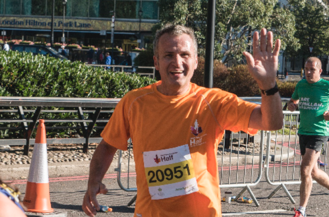 Director Runs Marathon for Charity Perennial